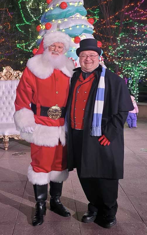 Customer photos wearing Santa and the Mayor